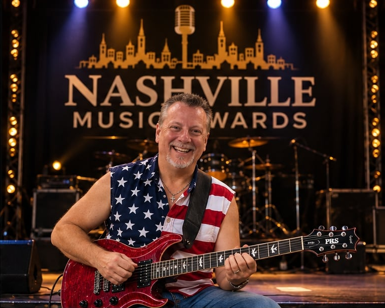 John DeRosa on Nashville Music Awards stage with red guitar